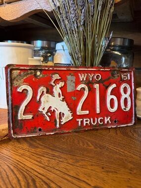 Vintage 1961 Wyoming bucking bronco Red Truck License Plate repainted for decor